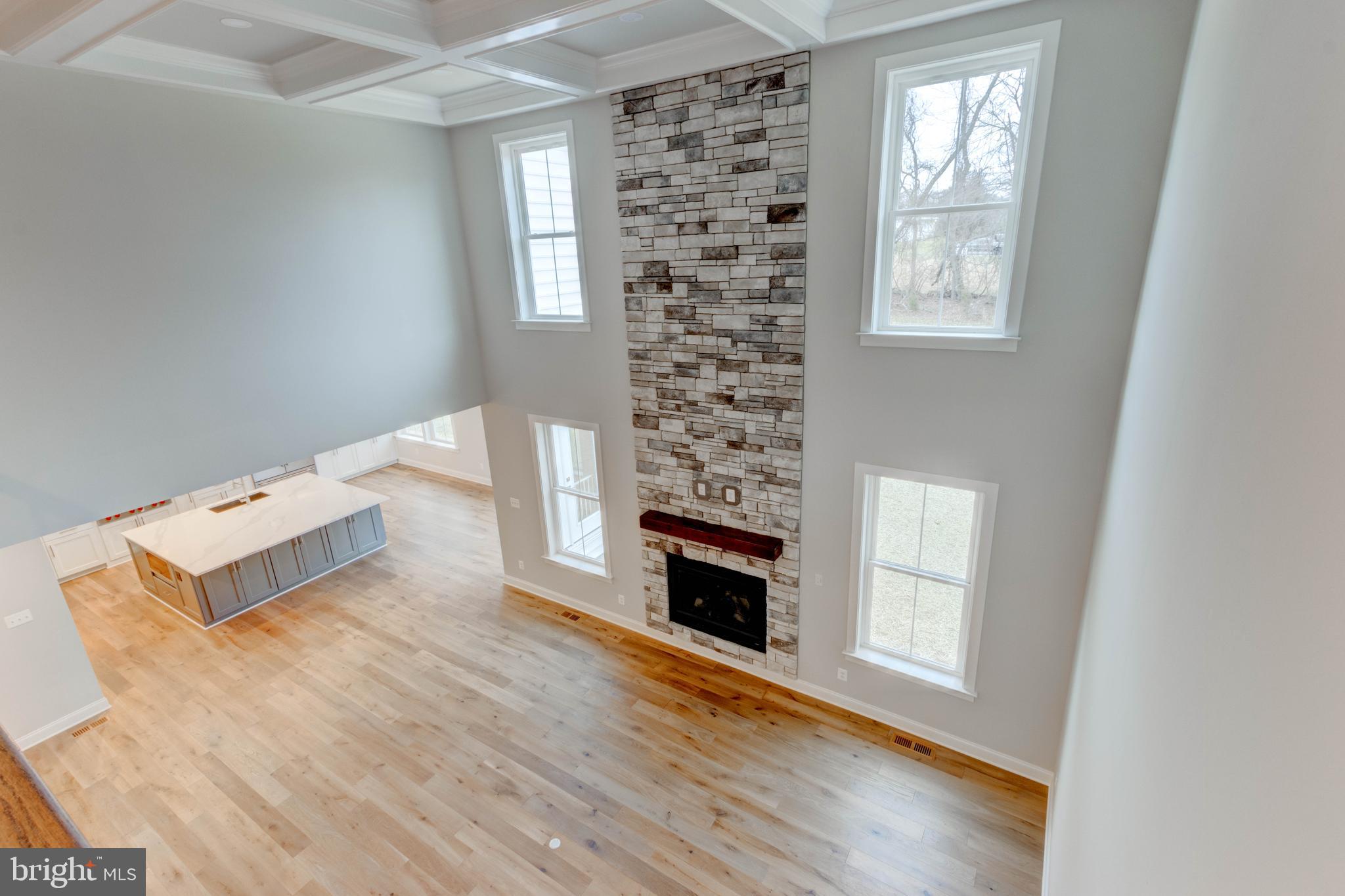 3114 Mt Zion Road Upperco, MD 21155 - Photo 20 of 61 a living room with furniture wooden floor and a fireplace