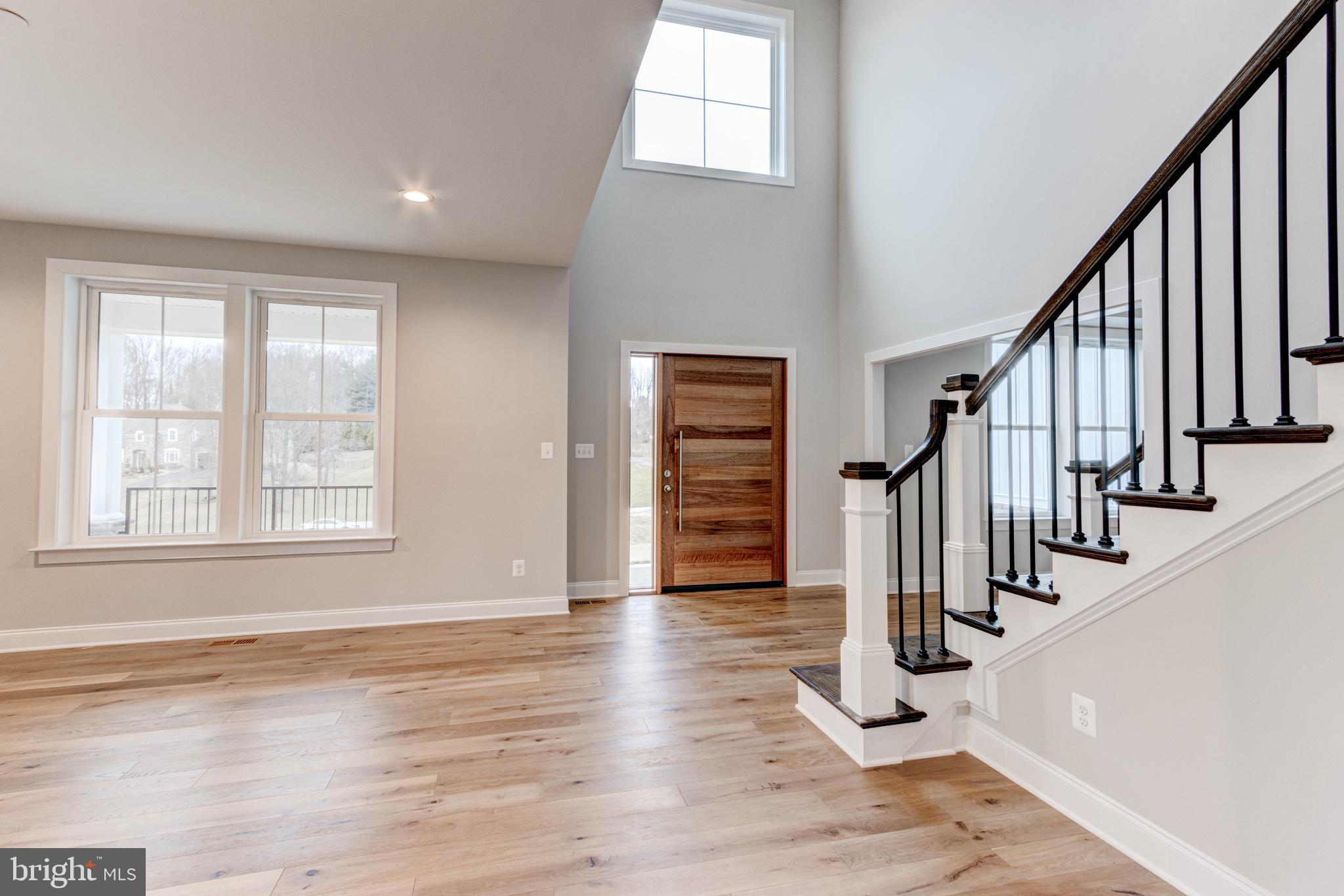 3114 Mt Zion Road Upperco, MD 21155 - Photo 29 of 61 a view of an entryway with wooden floor and stairs