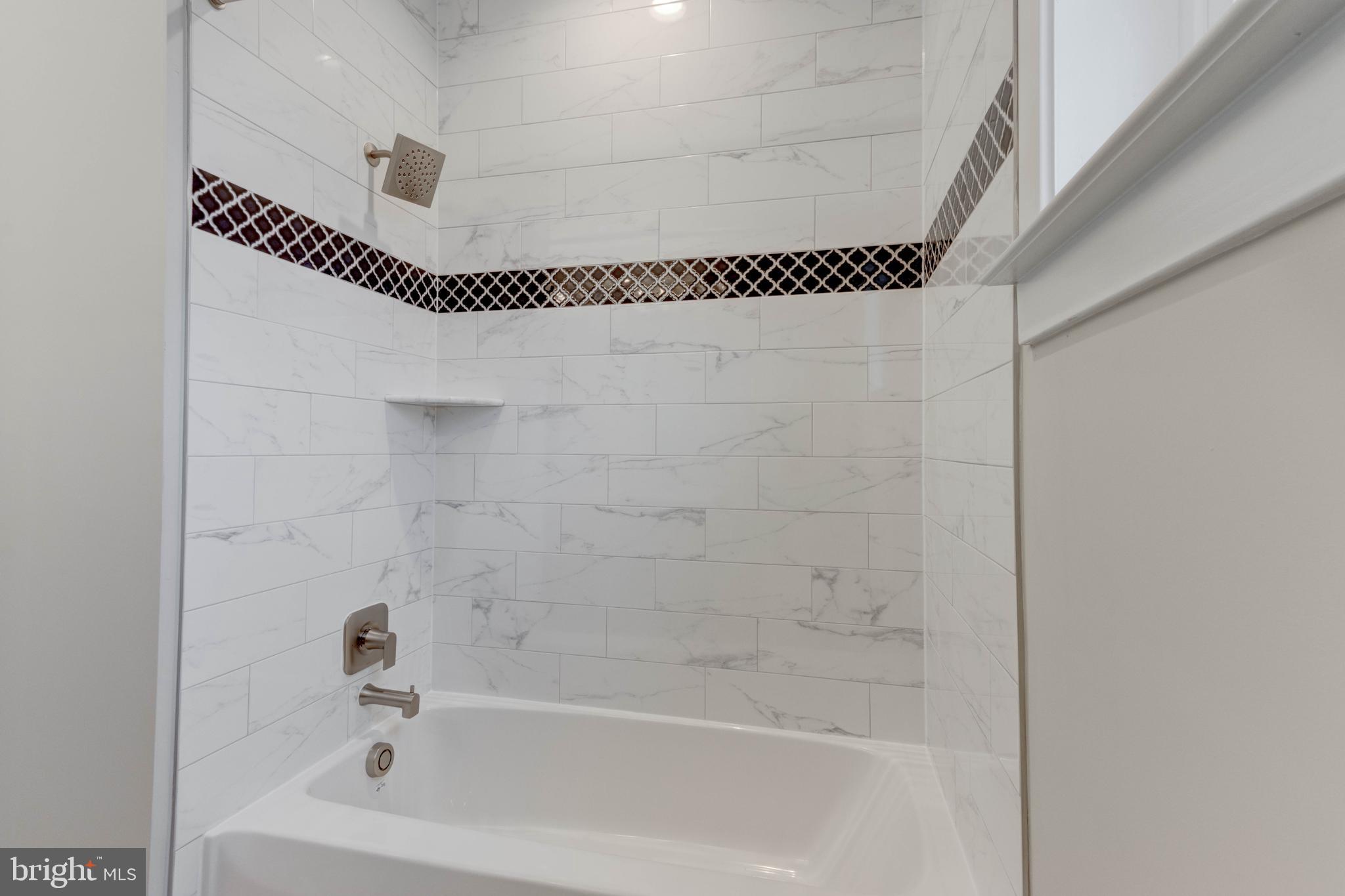 3114 Mt Zion Road Upperco, MD 21155 - Photo 36 of 61 a bathroom with a shower a bathtub and a shower