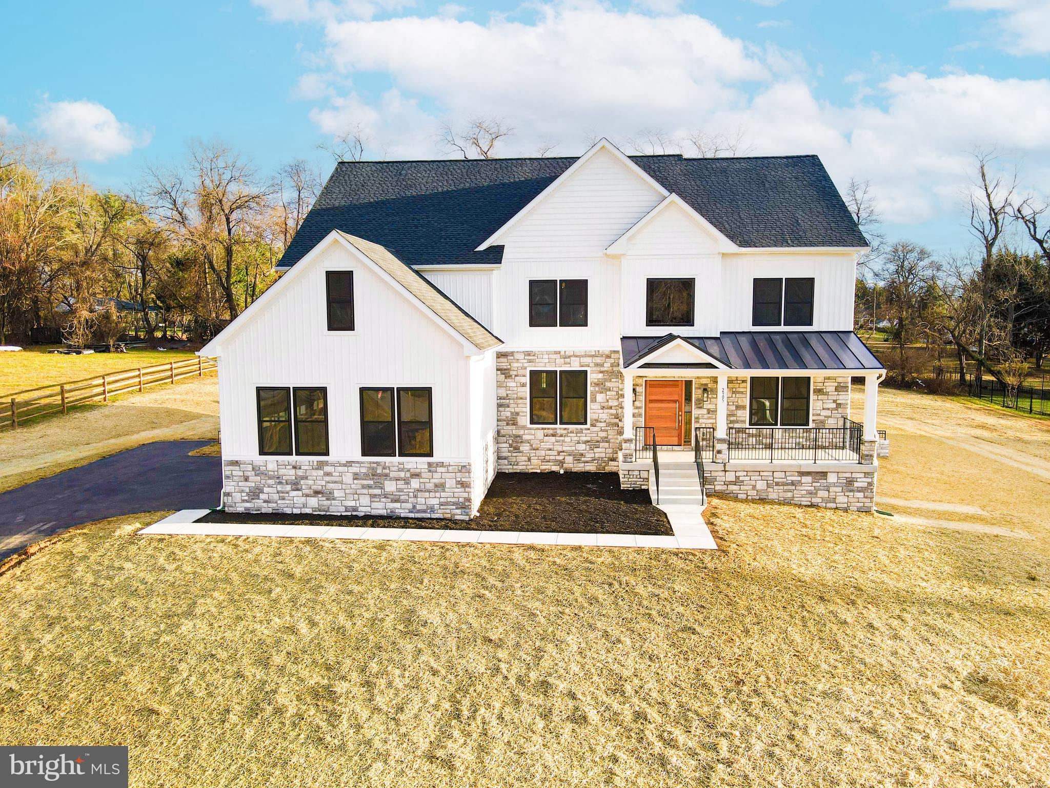 3114 Mt Zion Road Upperco, MD 21155 - Photo 4 of 61 a front view of a house with a yard