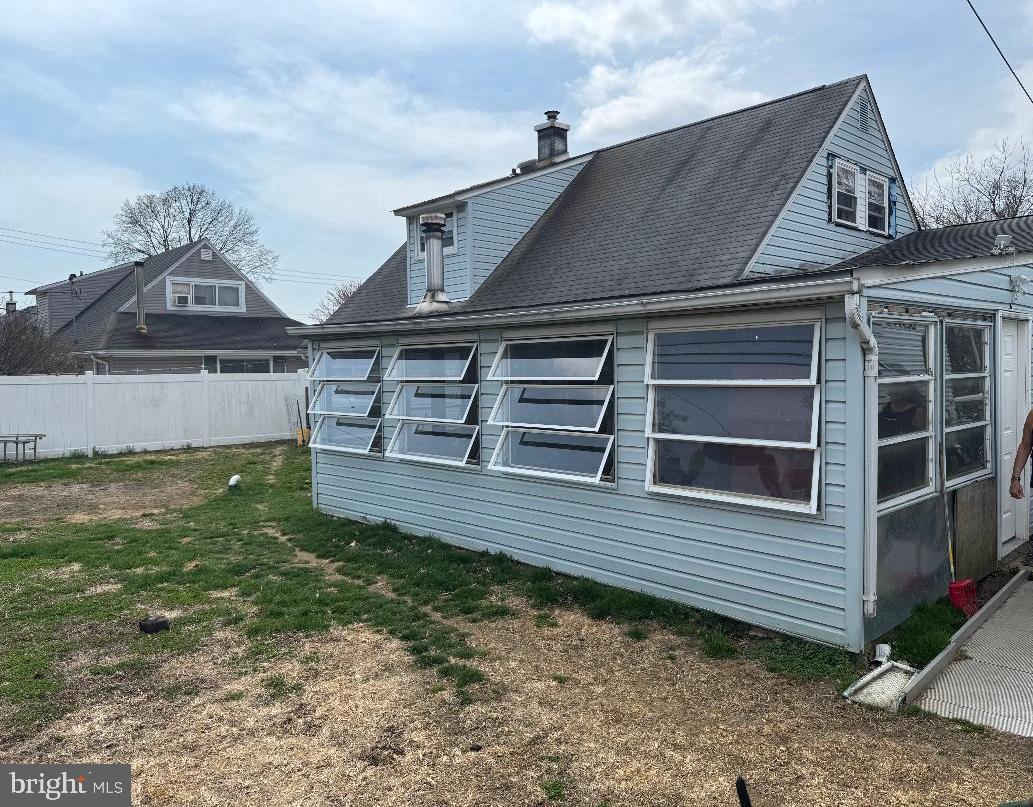 46 Trail Road Levittown, PA 19056 - Photo 4 of 5 a front view of a house with a yard