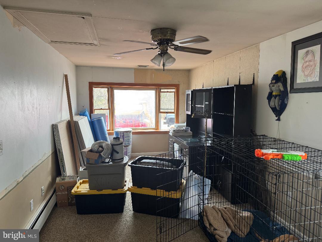 46 Trail Road Levittown, PA 19056 - Photo 5 of 5 a living room with furniture and a flat screen tv