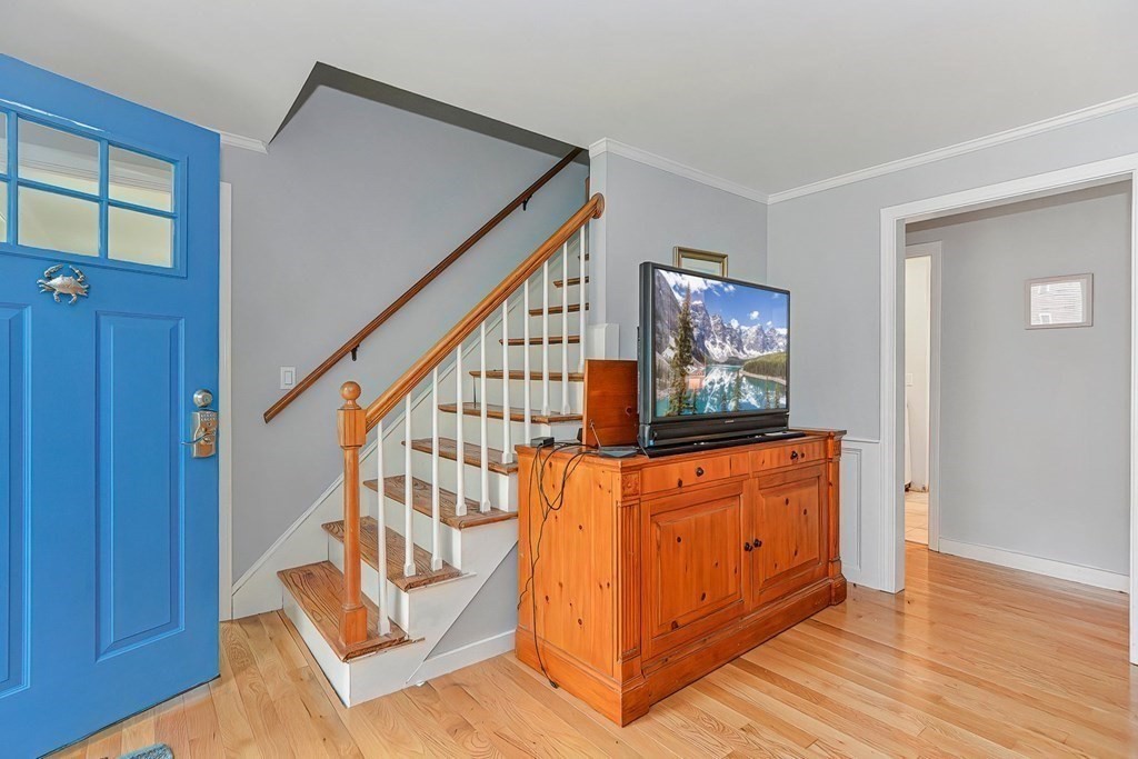 79 Emerson Way Barnstable, MA 02632 - Photo 3 of 29 a view of an entryway with wooden floor and door