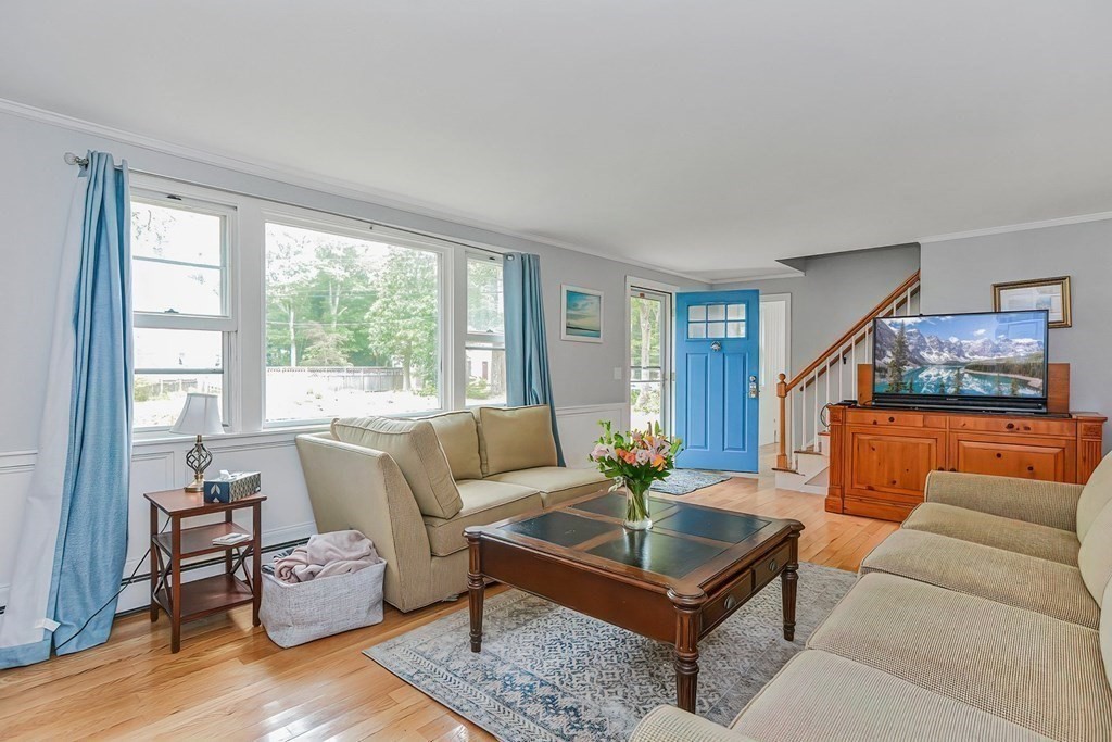 79 Emerson Way Barnstable, MA 02632 - Photo 4 of 29 a living room with furniture and a large window
