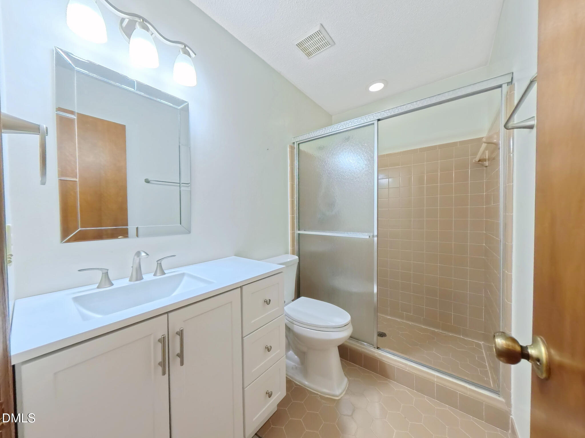 5867 Branchwood Road Raleigh, NC 27609 - Photo 13 of 16 5867 Branchwood Primary Bath