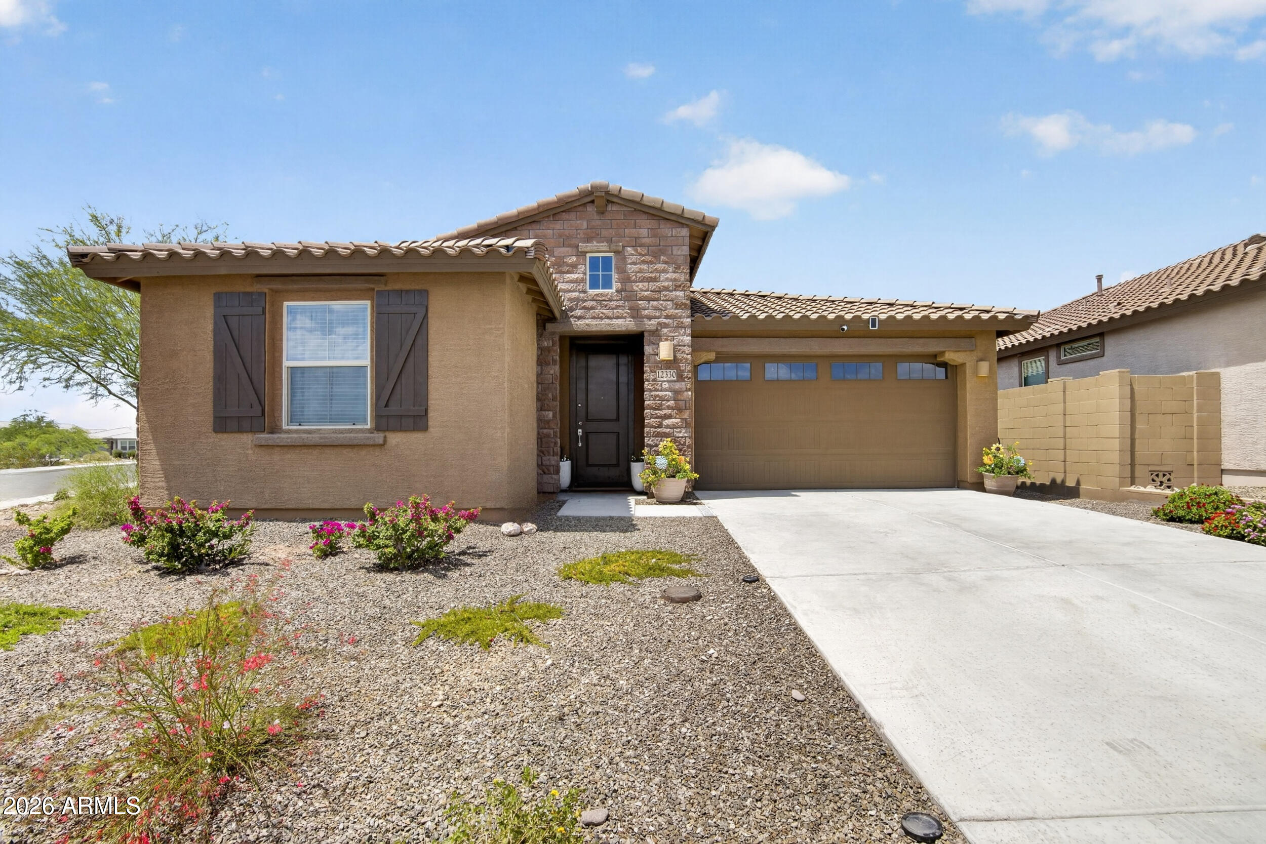 12330 East Soloman Road Gold Canyon, AZ 85118 - Photo 6 of 69 a front view of a house with a yard