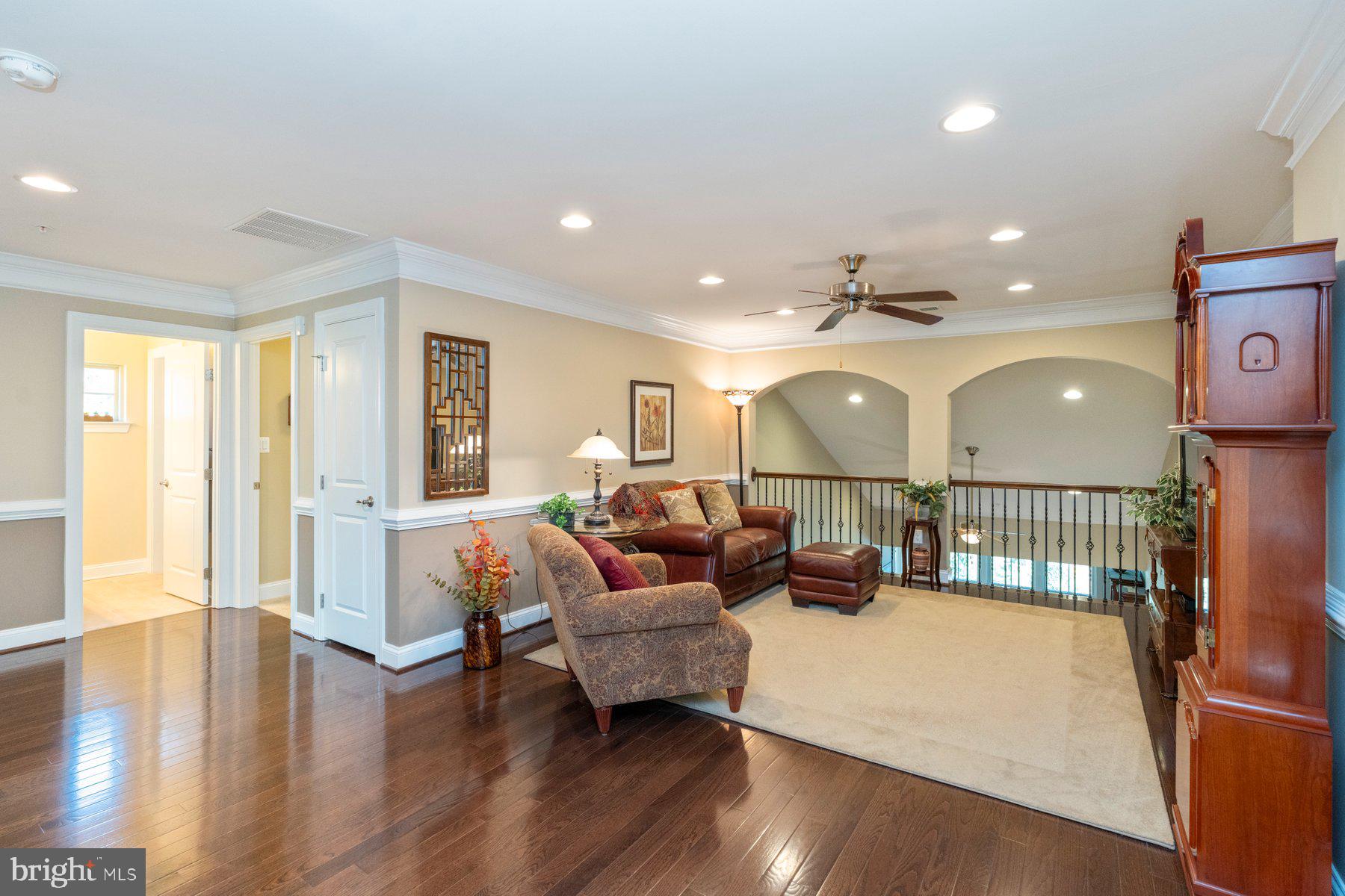 6931 Summit Circle Baltimore, MD 21239 - Photo 14 of 39 a living room with furniture and wooden floor