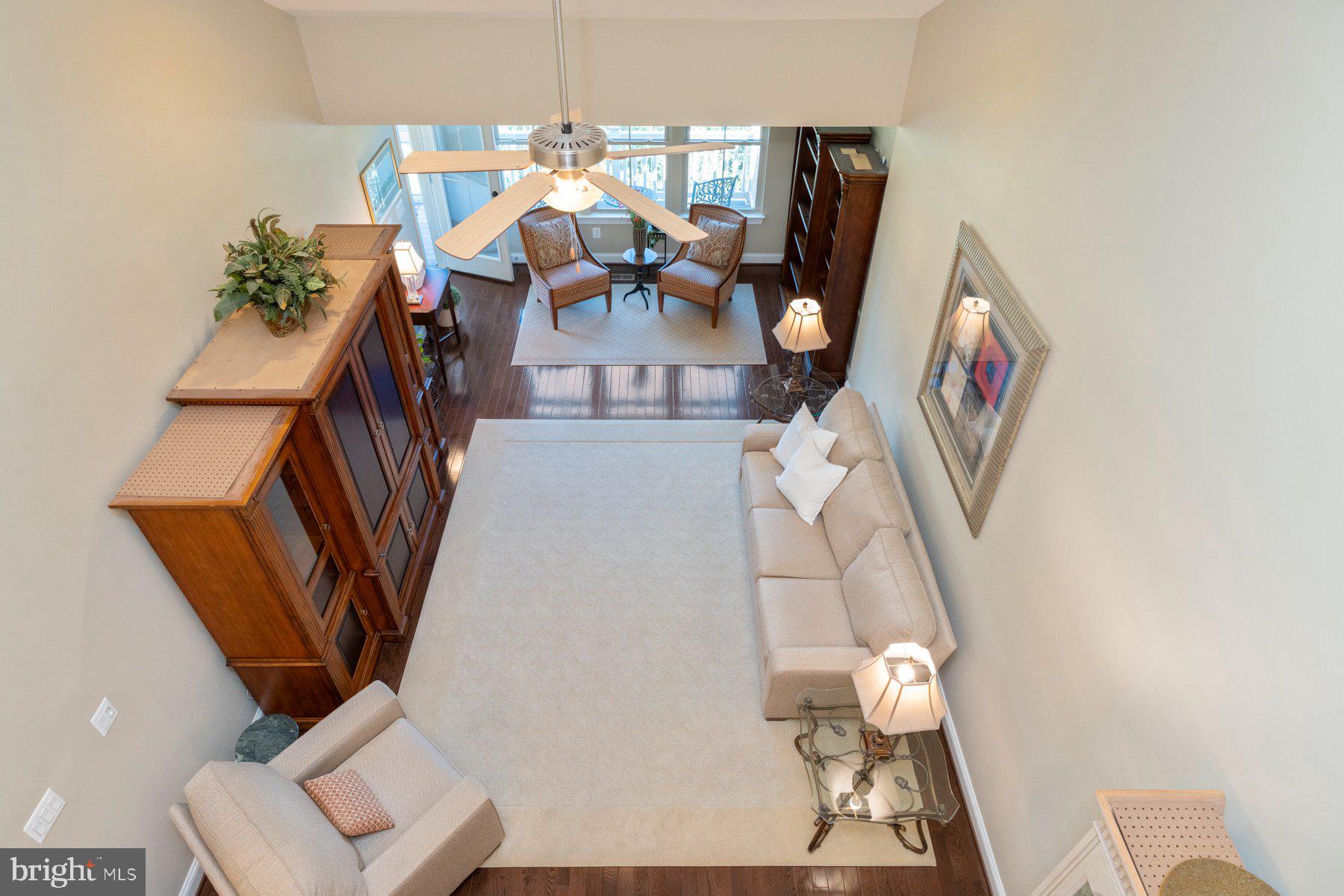 6931 Summit Circle Baltimore, MD 21239 - Photo 15 of 39 a living room with furniture and a chandelier