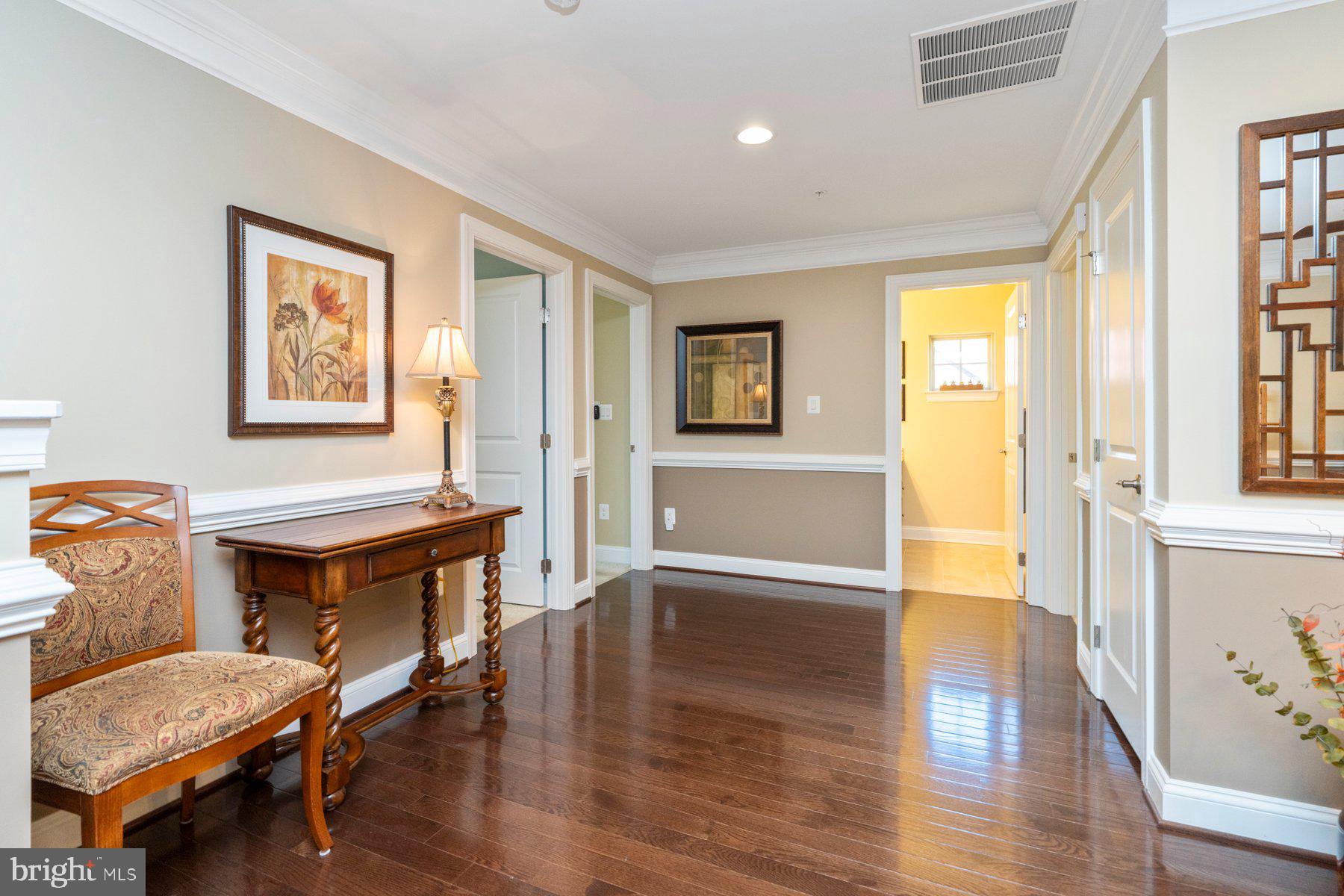 6931 Summit Circle Baltimore, MD 21239 - Photo 22 of 39 a view of a livingroom with furniture and a workspace