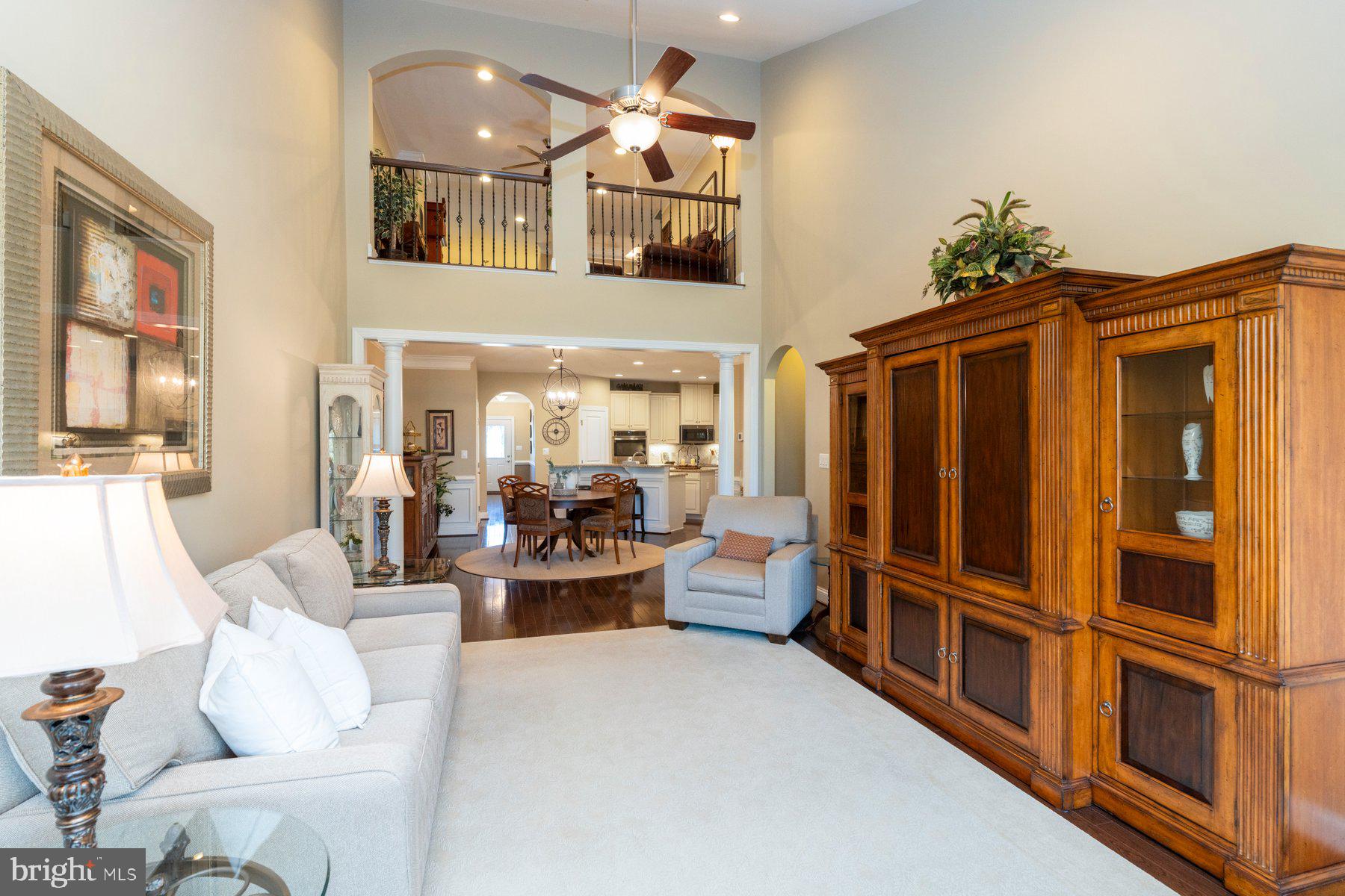 6931 Summit Circle Baltimore, MD 21239 - Photo 6 of 39 a living room with furniture ceiling fan and a window