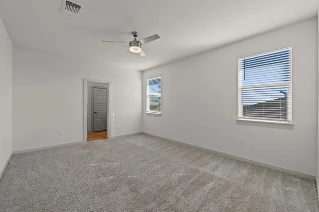 a view of a big room with wooden floors