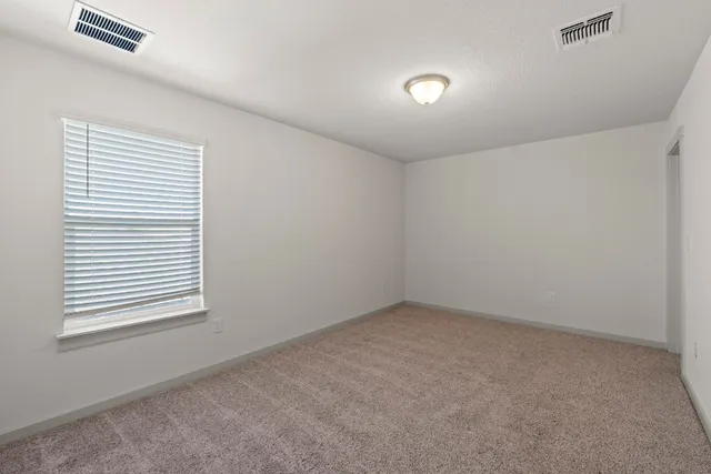 a view of a backyard of a house