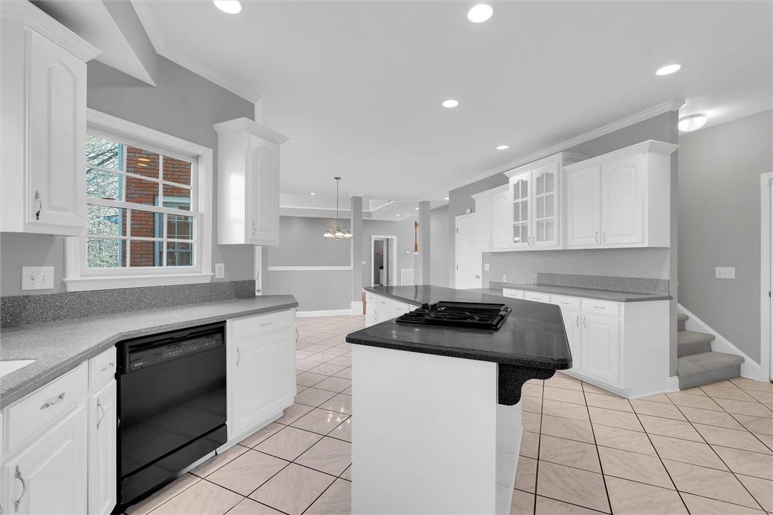 204 Red Maple Way Clemson, SC 29631 - Photo 15 of 48 This spacious kitchen offers a functional layout with ample counter space and storage.