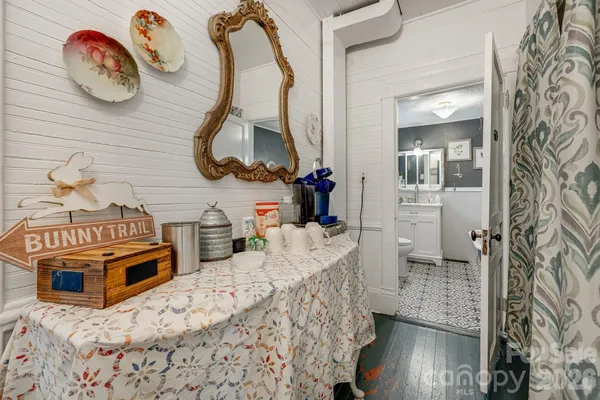 a bedroom with bed and cabinets