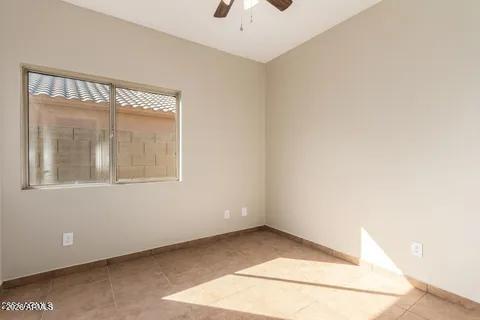 40620 North Key Lane Anthem, AZ 85086 - Photo 18 of 24 a view of an empty room with a window