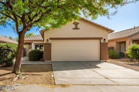 40620 North Key Lane Anthem, AZ 85086 - Photo 22 of 24 a front view of a house with a yard