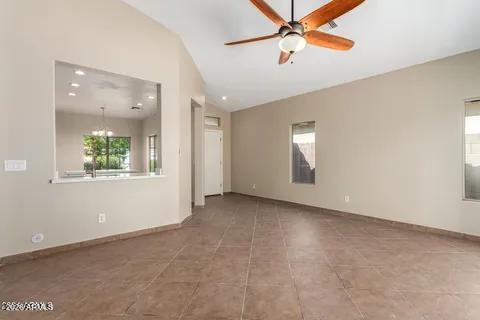 40620 North Key Lane Anthem, AZ 85086 - Photo 4 of 24 an empty room with windows and fan