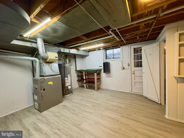 a utility room with cabinets