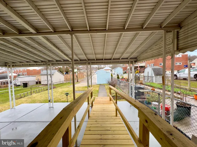 a view of swimming pool with seating