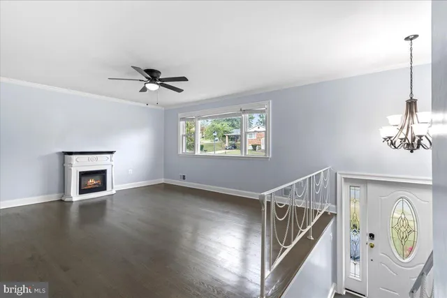 a view of an entryway with wooden floor
