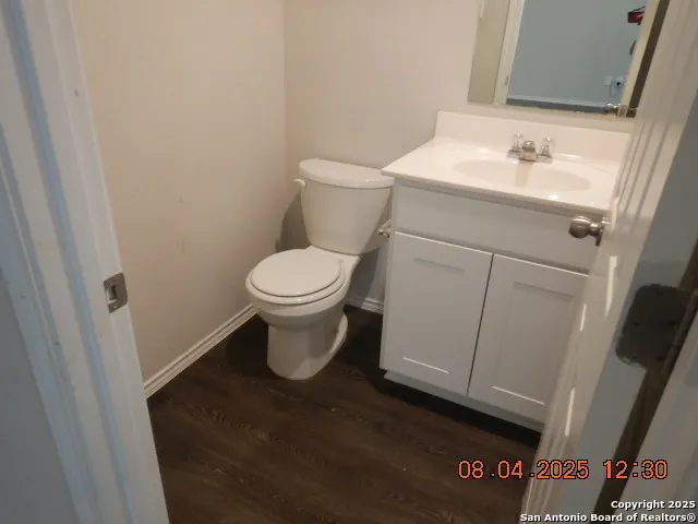 a bathroom with a sink and a toilet