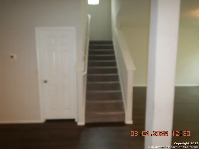 a view of entryway with stairs