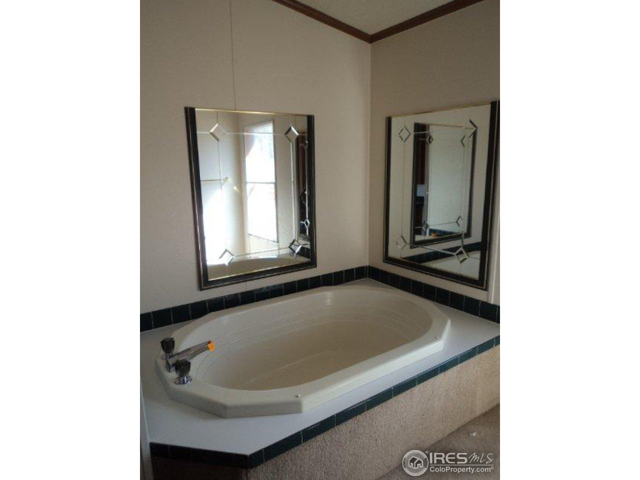 37 Caesar Road Black Hawk, CO 80422 - Photo 16 of 21 a bath tub sitting in a bathroom next to a window