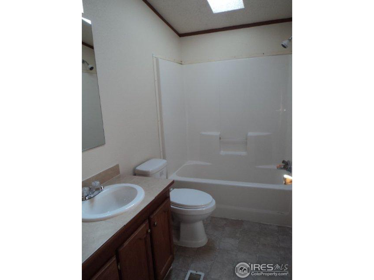 37 Caesar Road Black Hawk, CO 80422 - Photo 17 of 21 a bathroom with a granite countertop toilet a sink and a bathtub