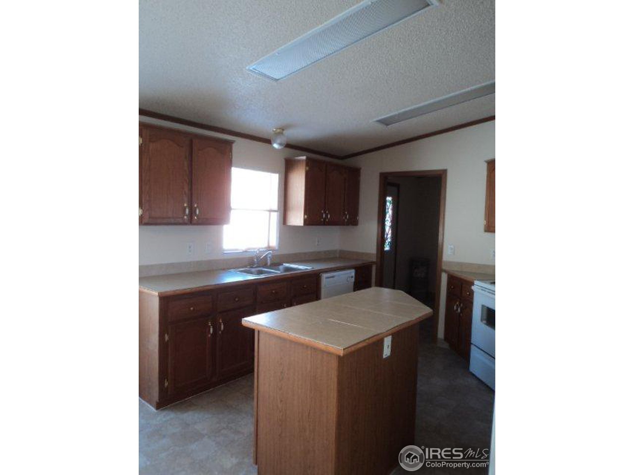 37 Caesar Road Black Hawk, CO 80422 - Photo 8 of 21 a utility room with sink washer and dryer