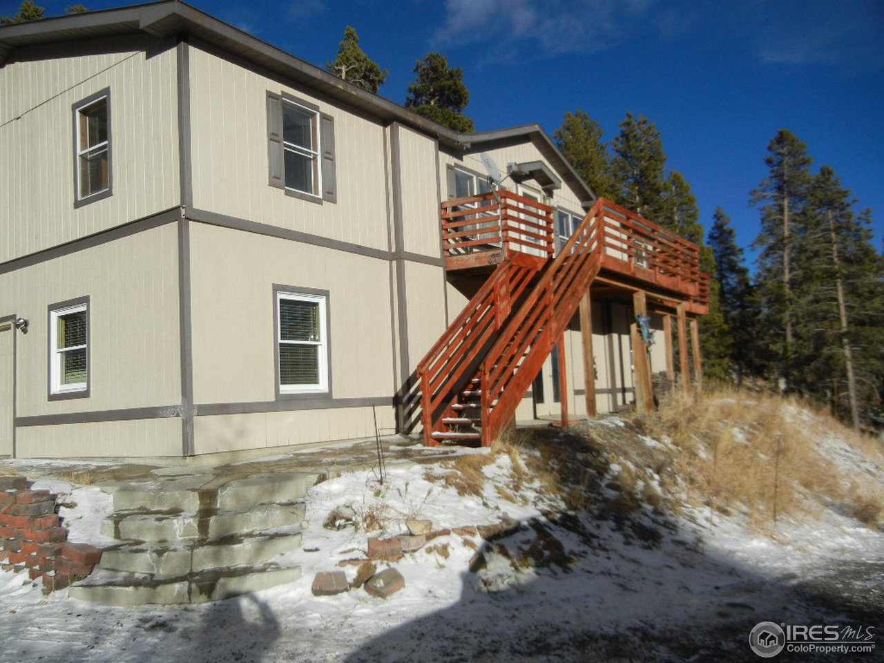 37 Caesar Road Black Hawk, CO 80422 - Photo 9 of 21 a front view of a house with a yard