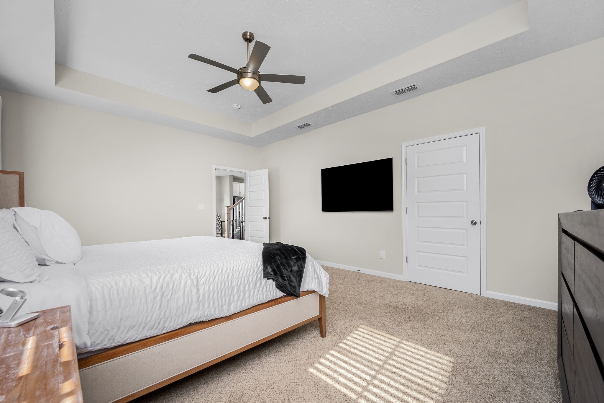 64 North Fork Branch Road Tullahoma, TN 37388 - Photo 26 of 49 a bedroom with a bed a ceiling fan and a rug