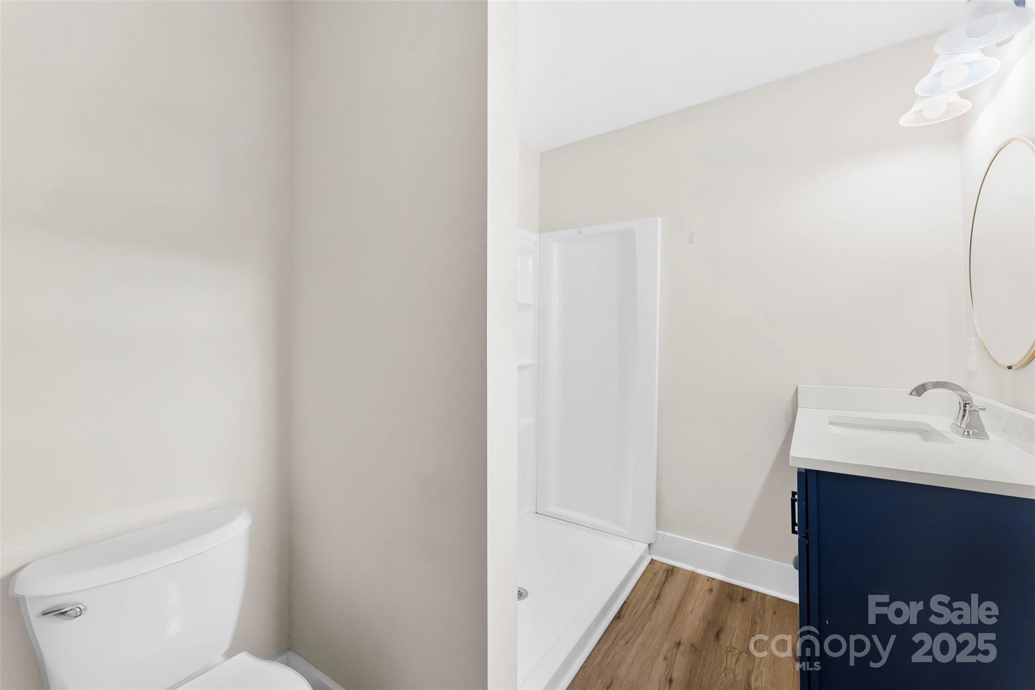 601 Rhyne Circle, Unit B Gastonia, NC 28054 - Photo 17 of 32 a bathroom with a sink and a mirror