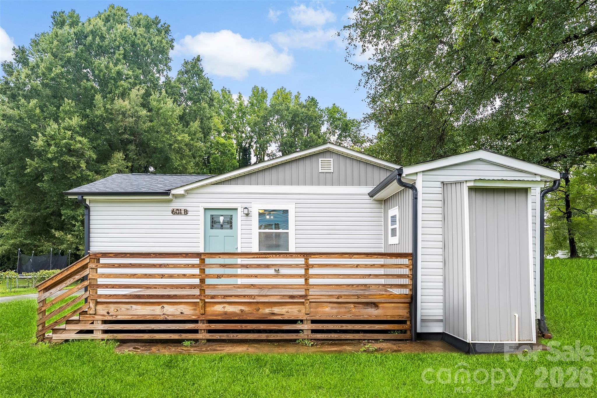 601 Rhyne Circle, Unit B Gastonia, NC 28054 - Photo 2 of 32 a view of a house with a yard
