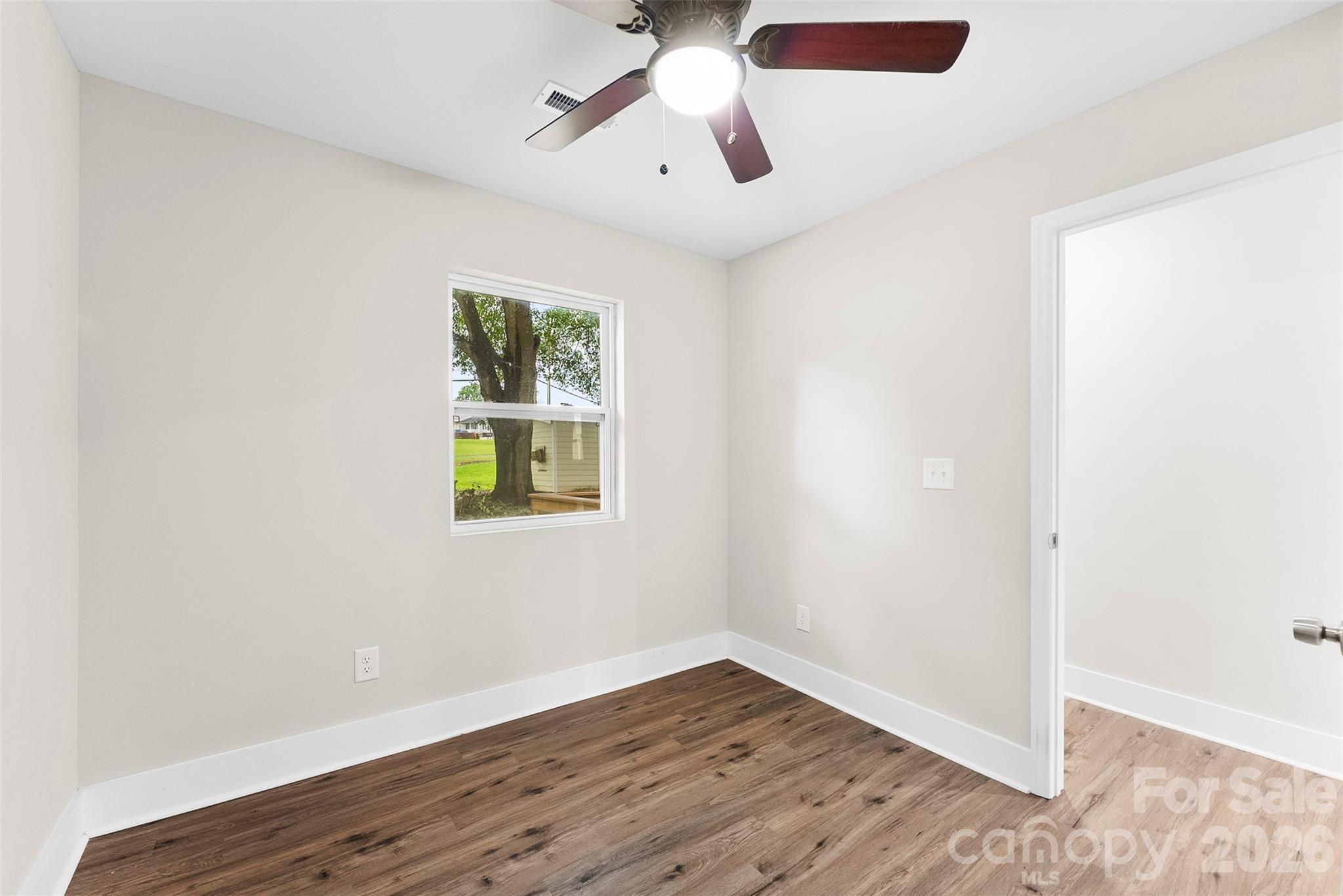 601 Rhyne Circle, Unit B Gastonia, NC 28054 - Photo 24 of 32 a view of empty room with wooden floor