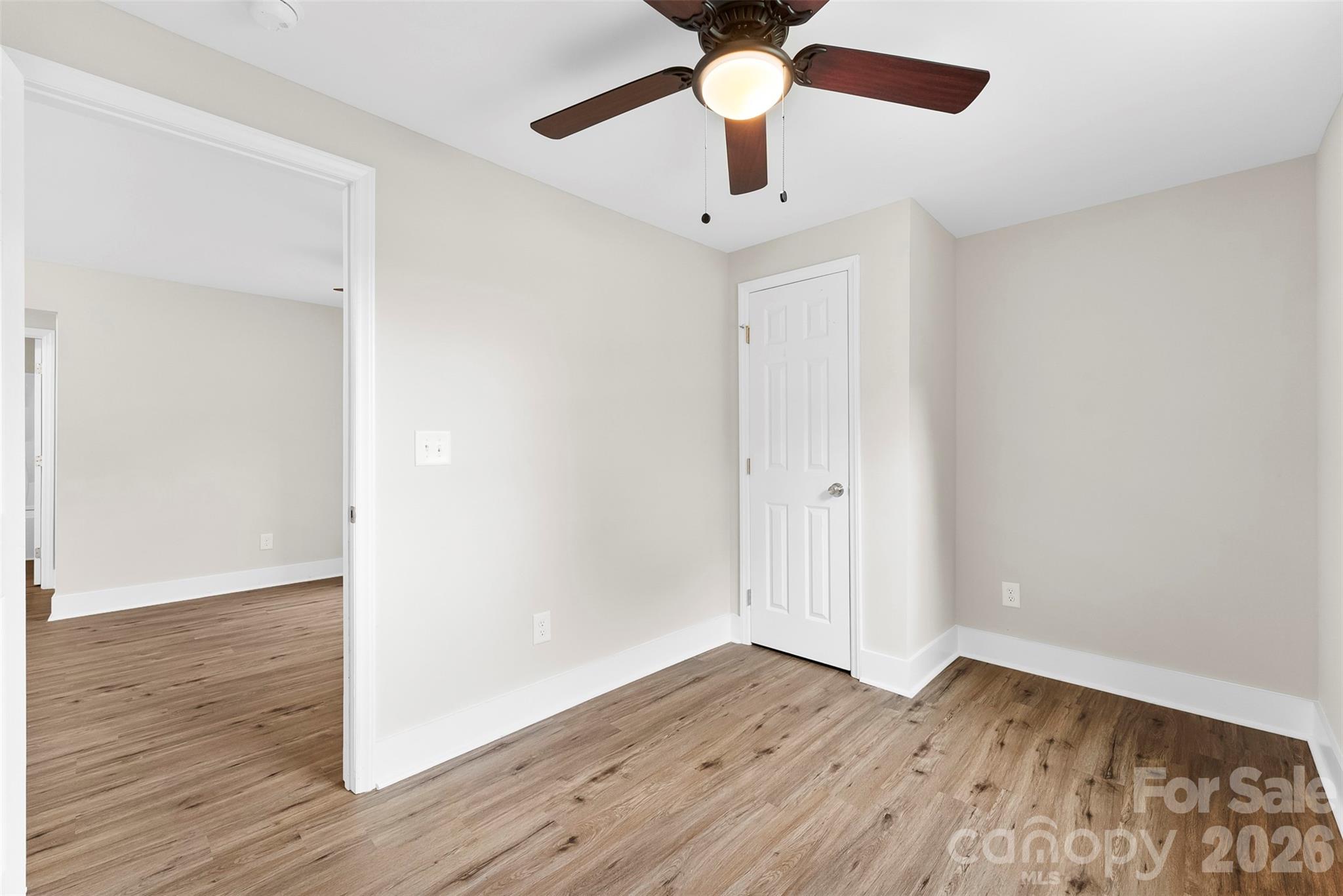 601 Rhyne Circle, Unit B Gastonia, NC 28054 - Photo 26 of 32 wooden floor in an empty room