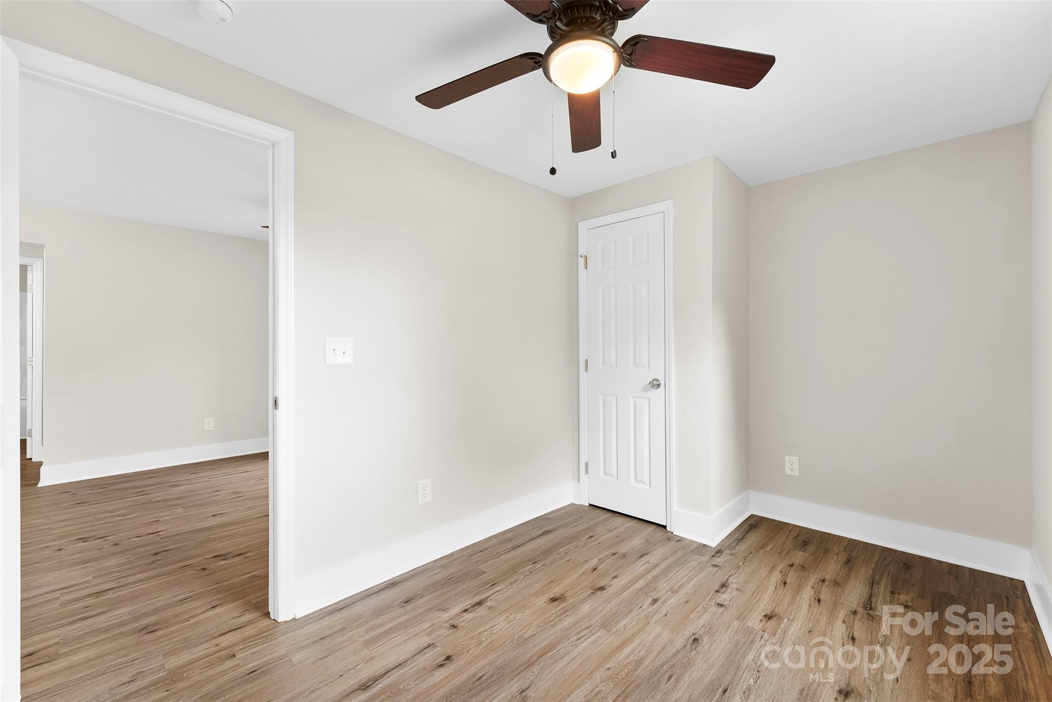 601 Rhyne Circle, Unit B Gastonia, NC 28054 - Photo 26 of 32 wooden floor in an empty room