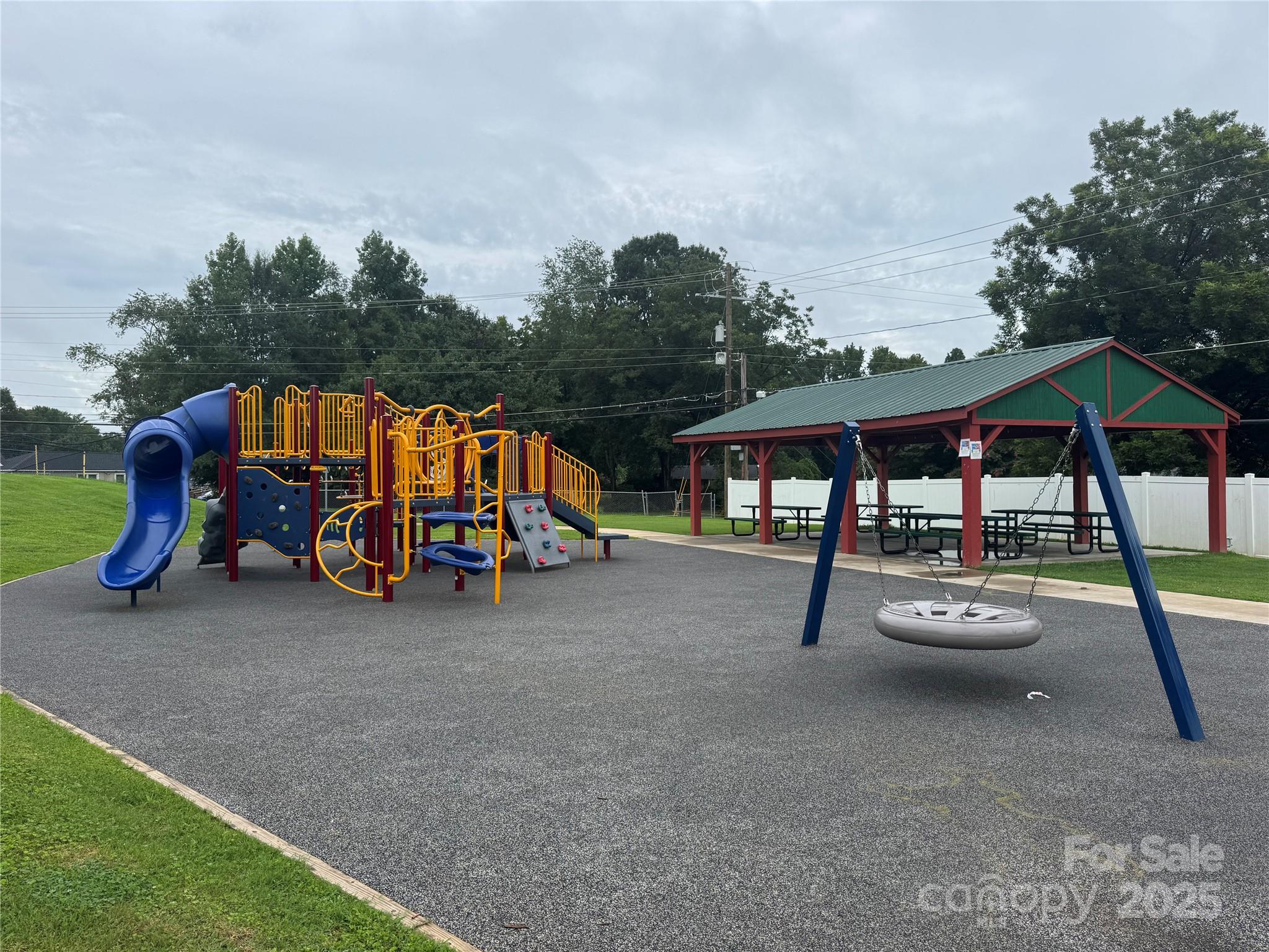601 Rhyne Circle, Unit B Gastonia, NC 28054 - Photo 31 of 32 a view of swimming pool with sitting area and roof