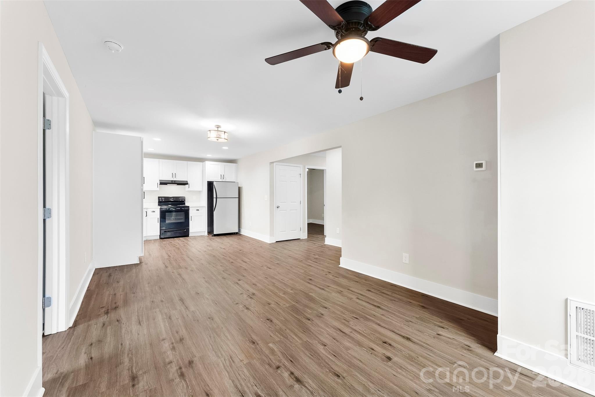 601 Rhyne Circle, Unit B Gastonia, NC 28054 - Photo 6 of 32 a view of empty room with wooden floor