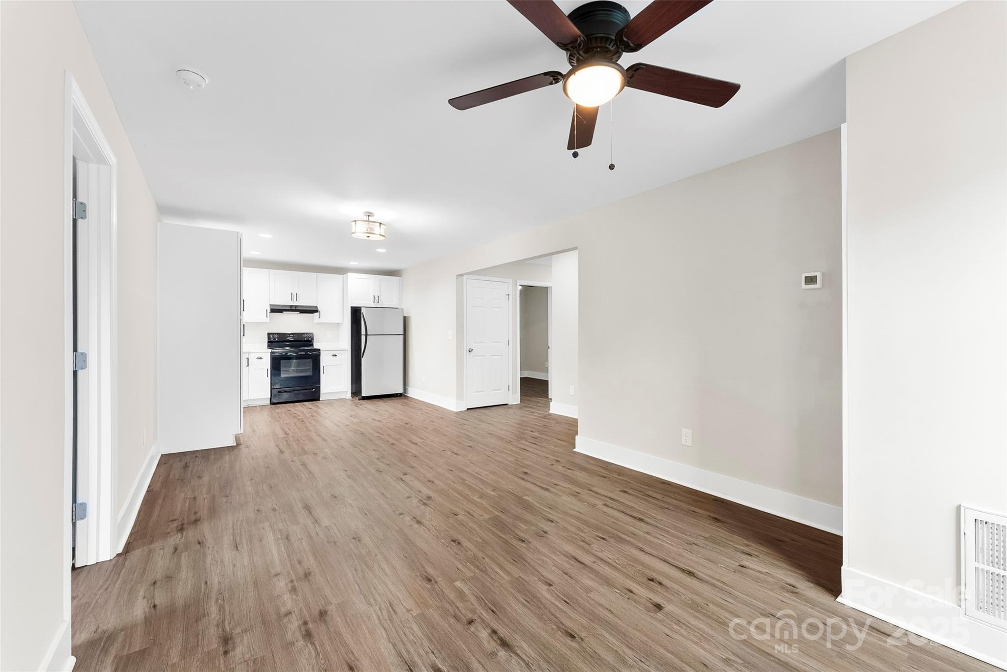 601 Rhyne Circle, Unit B Gastonia, NC 28054 - Photo 6 of 32 a view of empty room with wooden floor