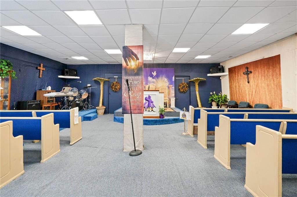 1583 Ralph David Abernathy Boulevard Southwest Atlanta, GA 30310 - Photo 11 of 24 a view of a room with lots of tables and chairs