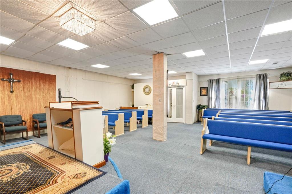 1583 Ralph David Abernathy Boulevard Southwest Atlanta, GA 30310 - Photo 21 of 24 a view of a livingroom with furniture and a rug