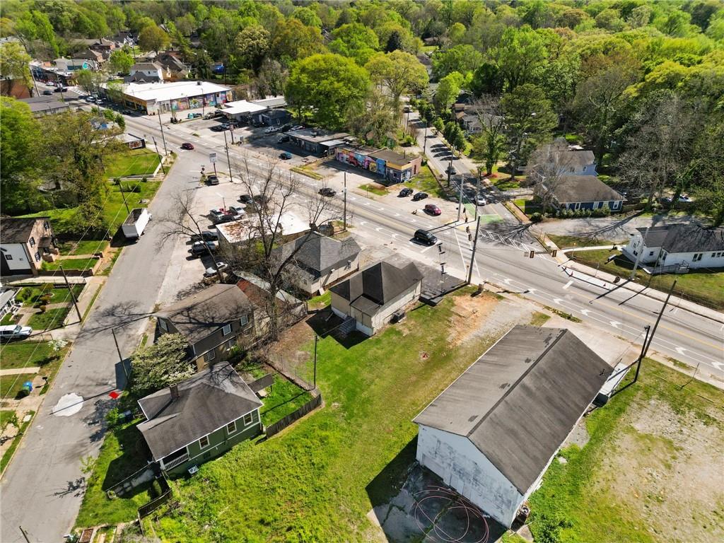 1583 Ralph David Abernathy Boulevard Southwest Atlanta, GA 30310 - Photo 4 of 24 an aerial view of residential houses with outdoor space