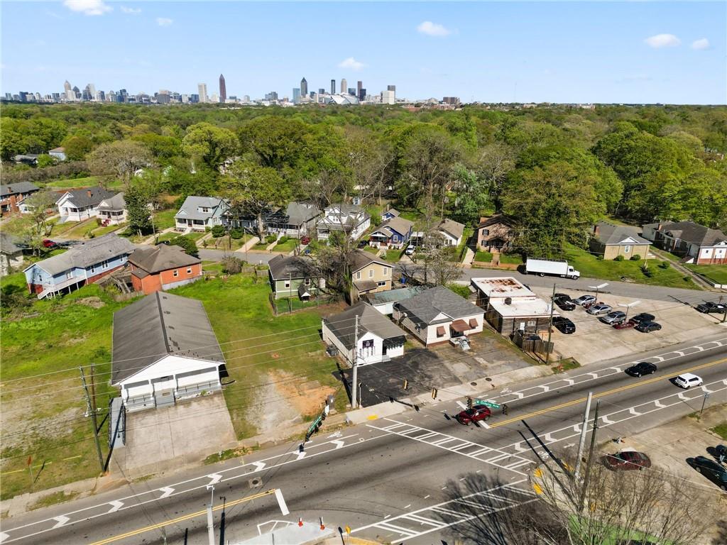 1583 Ralph David Abernathy Boulevard Southwest Atlanta, GA 30310 - Photo 5 of 24 an aerial view of residential houses with outdoor space