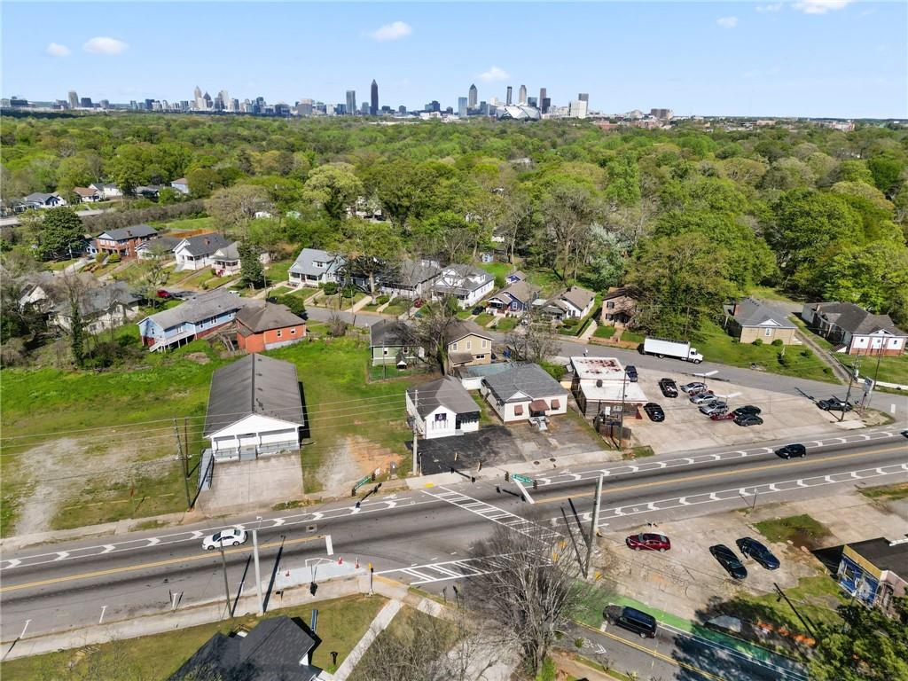 1583 Ralph David Abernathy Boulevard Southwest Atlanta, GA 30310 - Photo 6 of 24 an aerial view of residential houses with outdoor space and river