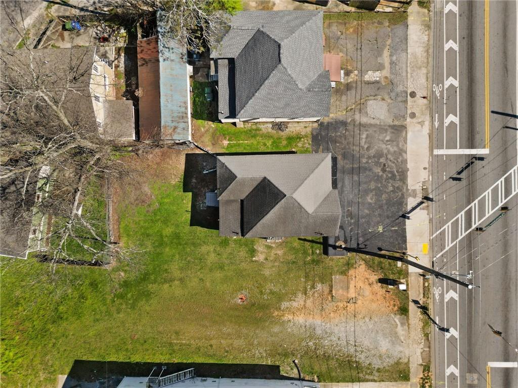 1583 Ralph David Abernathy Boulevard Southwest Atlanta, GA 30310 - Photo 9 of 24 front view of a house with a yard