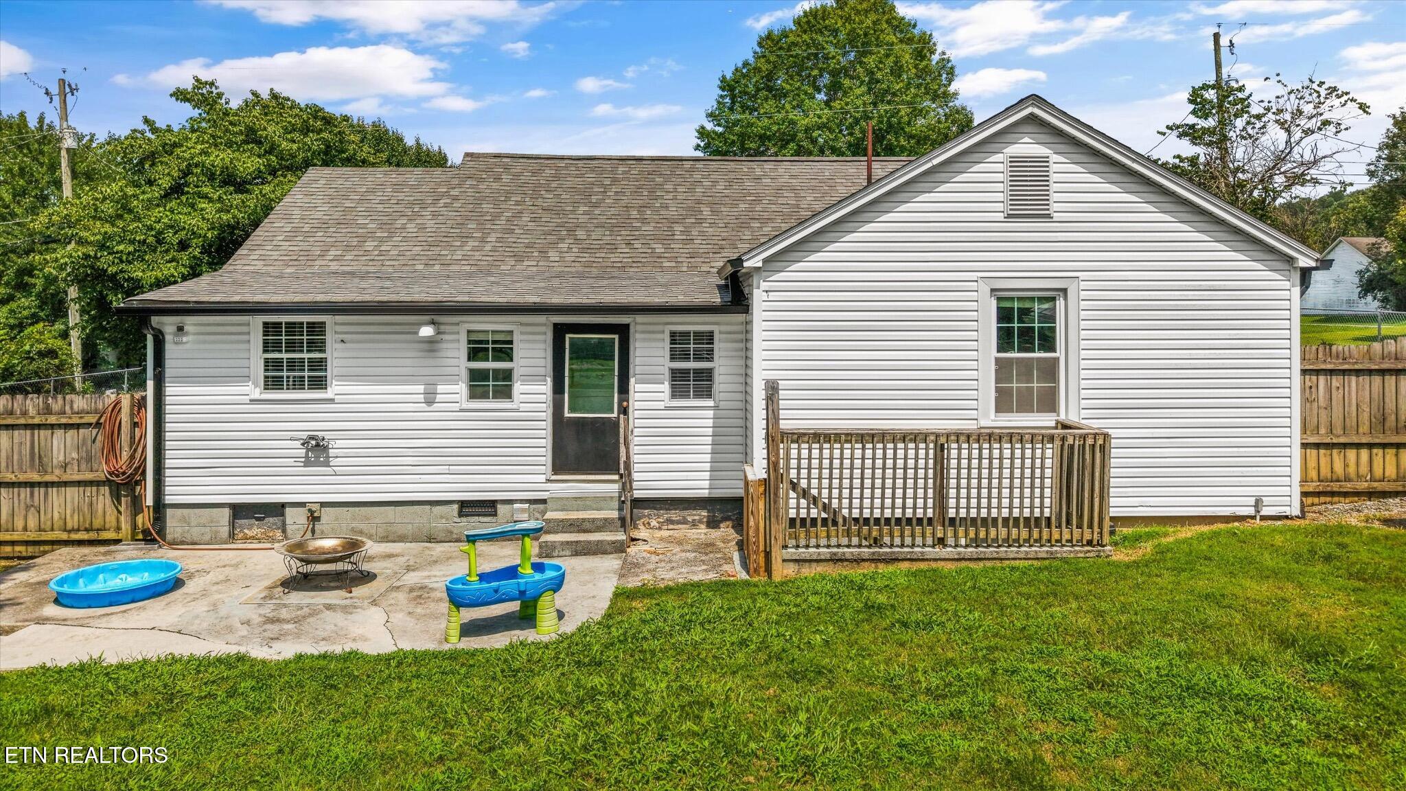 6411 Bob Varner Road Knoxville, TN 37918 - Photo 28 of 32 6411-bob-varner-rd-knoxville-tn-rear-ext