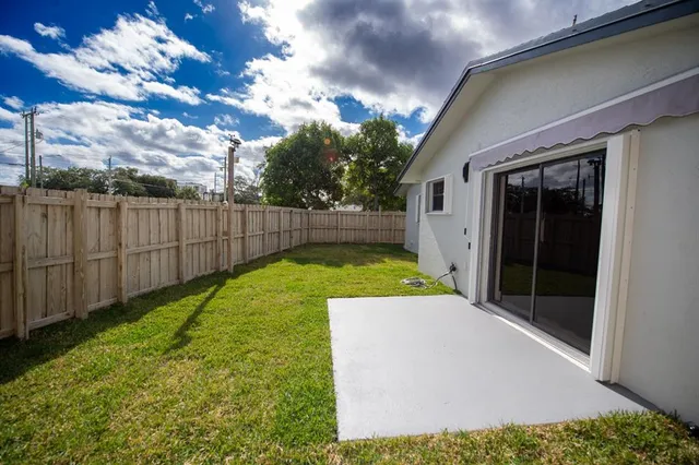 a bathroom with a shower and toilet