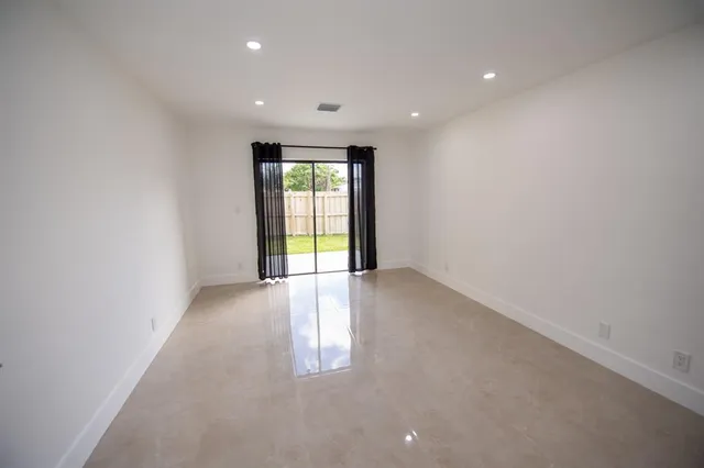 a view of a kitchen with a sink
