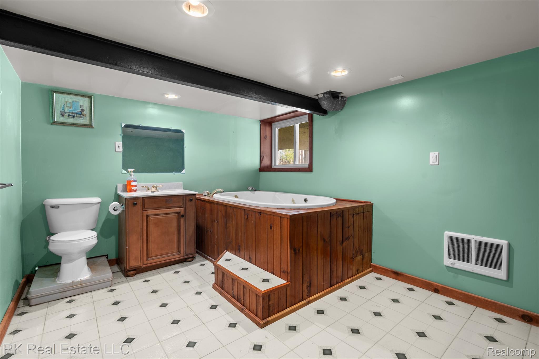 13799 31 Mile Road Washington, MI 48095 - Photo 31 of 40 Full bathroom featuring vanity, a whirlpool tub, beamed ceiling, and recessed lighting