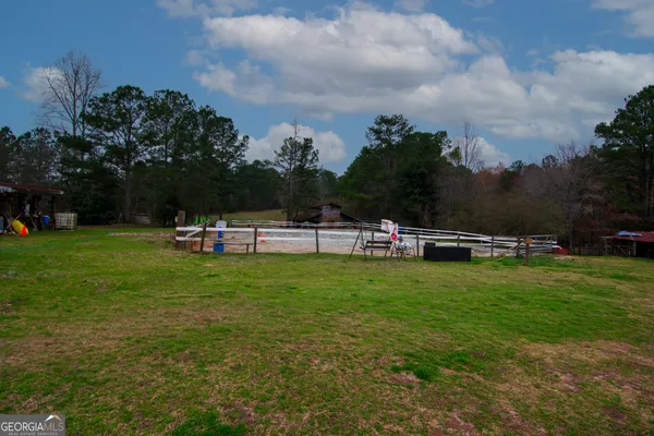 a view of a lake with a yard